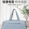 A light blue Oxford gym duffel bag with a padded handle is shown against a white background.