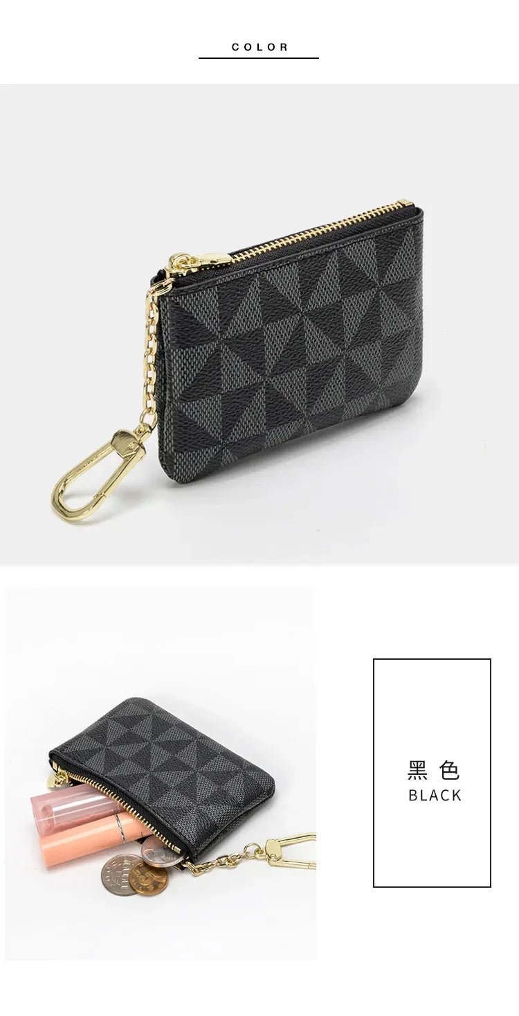 Black geometric mini coin purse with gold chain shown against a white background.