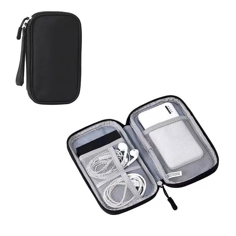 A black waterproof cable organizer storage bag with an open compartment showing multiple mesh pockets for organizing cables.