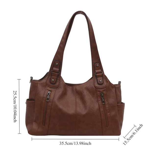 A brown leather everyday large-capacity shoulder tote bag shown from the front view.