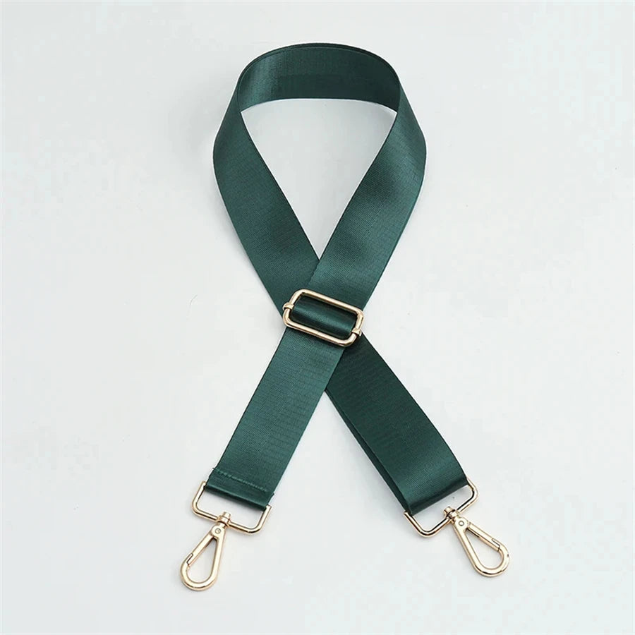A dark green nylon adjustable shoulder strap with gold-toned hardware.
