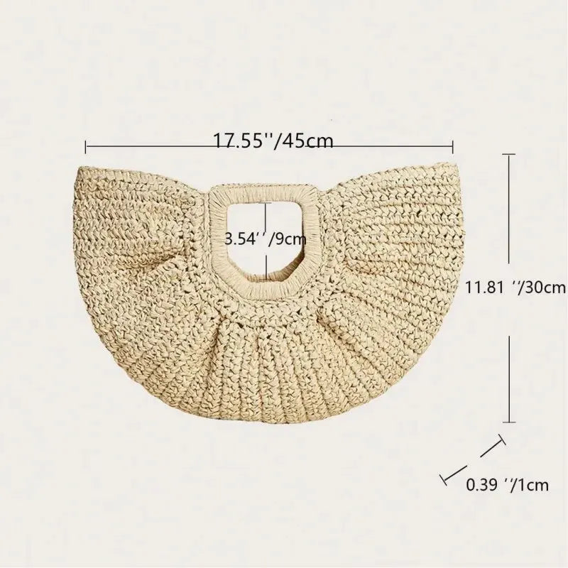 A beige rattan half-moon beach handbag with a textured weave and a rectangular opening.