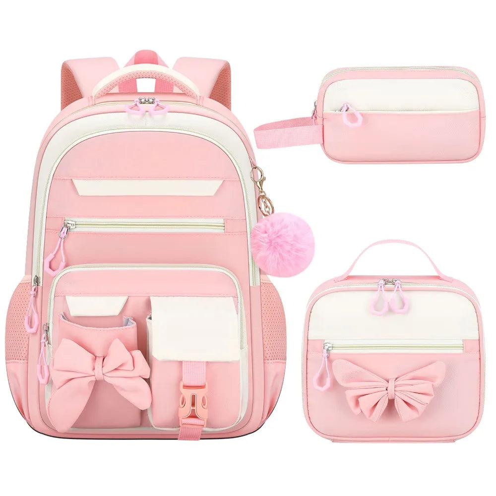 A pink cartoon school bag set for girls featuring a backpack, a pouch, and a small zippered case.
