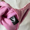 Pink striped makeup bag with a flip-top mirror shown in a close-up view.