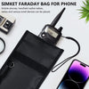 Sac Faraday noir pour téléphone et petits appareils à côté d'une radio portable.