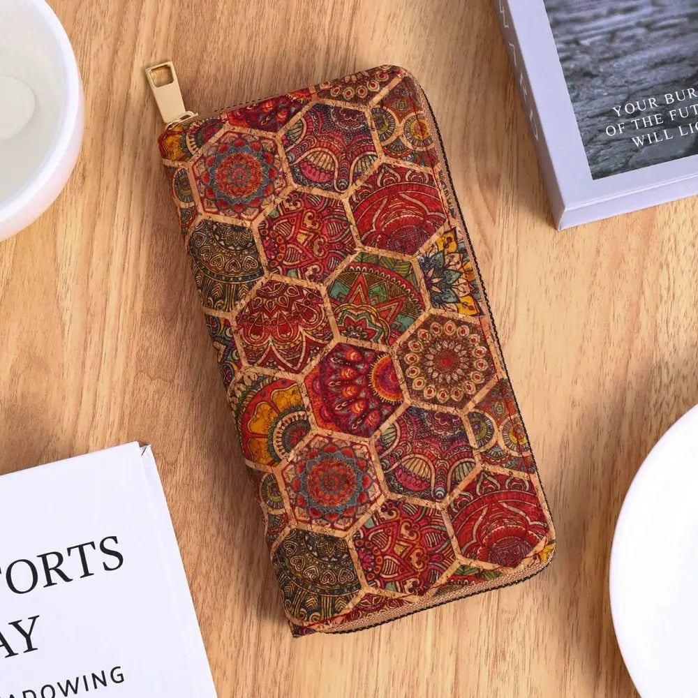 A patterned bohemian wood-grain leather wallet with multiple card slots resting on a wooden surface.