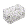 Bolsa de maquillaje con cremallera acolchada floral, fondo blanco y patrón floral morado