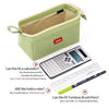 A light green pencil case with a label holder and elastic closure, shown next to various sized items for scale.