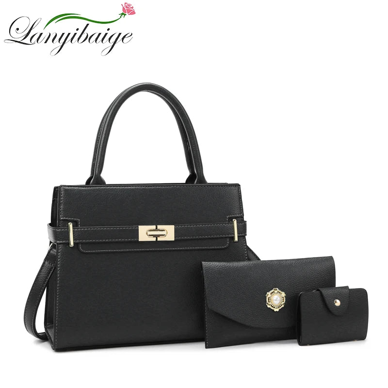 Black leather handbag with gold hardware and a strap displayed on a white background.