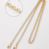 A delicate gold chain strap for handbags and crossbody bags shown with a close-up detail.