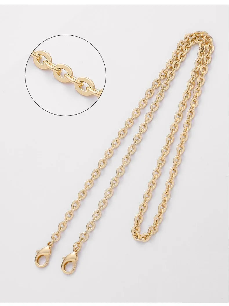 A delicate gold chain strap for handbags and crossbody bags shown with a close-up detail.