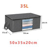A dark gray foldable storage bag with a mesh exterior and a clear window showing folded fabrics.