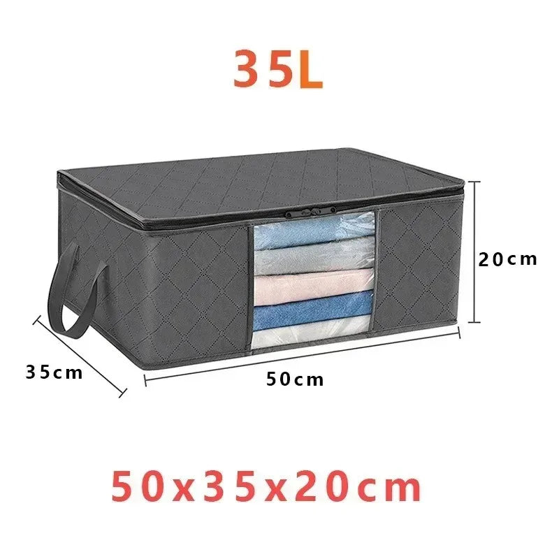 A dark gray foldable storage bag with a mesh exterior and a clear window showing folded fabrics.