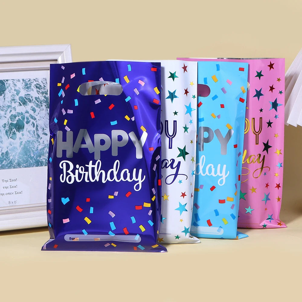 A set of ten colorful, foil-lined birthday party gift bags in various bright colors and designs.