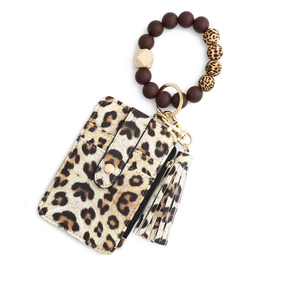 Leopard print leather card holder with a keychain bangle and wooden beads
