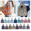 A collection of reusable eco tote shopping bags in various floral and patterned fabrics.