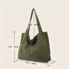 A large olive green canvas shoulder tote bag shown with dimensions.