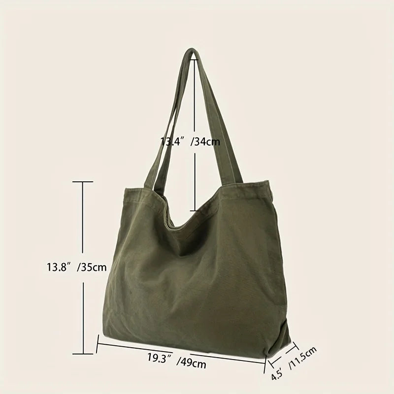 A large olive green canvas shoulder tote bag shown with dimensions.
