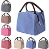 A collection of striped insulated lunch totes in blue, pink, and beige with adjustable shoulder straps.