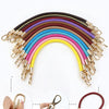 Rainbow colored PU leather replacement bag straps with metal buckles displayed in an arc formation
