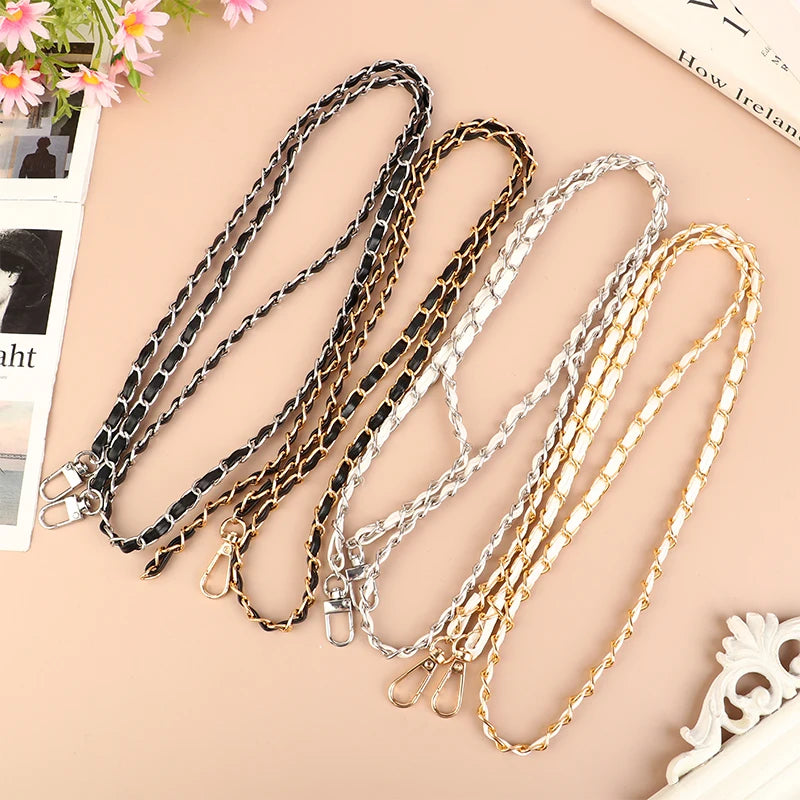 A collection of adjustable leather crossbody purse chain straps in black, gold, and silver tones.