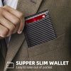 A close-up of a black carbon fiber slim wallet with an RFID protection feature is shown inside a suit jacket pocket.