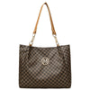 A brown geometric monogram tote bag with leather handles and a textured fabric pattern.