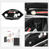 A black felt insert bag designed to organize and protect various small items like pens, tools, and accessories inside a handb