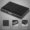 A black RFID blocking card holder with a smooth satin metal finish and round corners.
