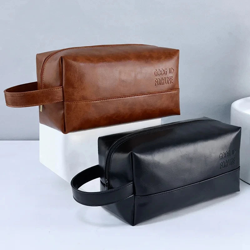 A brown and black portable PU leather cosmetic organizer bag displayed on a white surface.