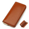 A brown genuine leather zipper wallet shown in a diagonal view with a close-up of the interior.
