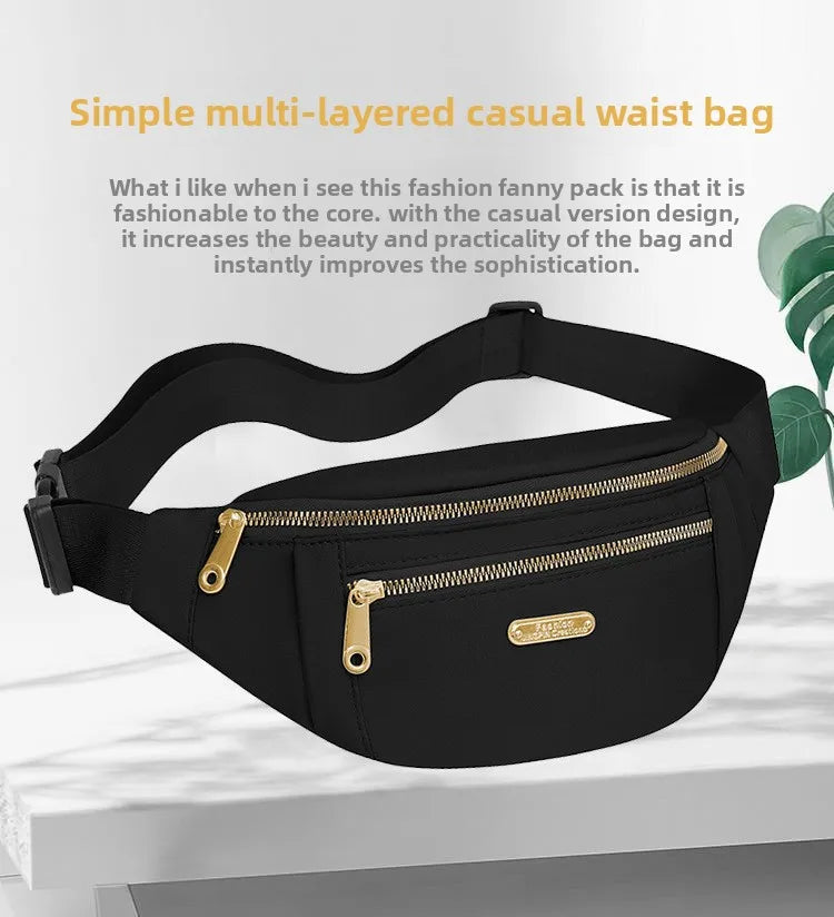 Sac de taille décontracté noir à plusieurs couches avec fermeture éclair et sangle dorée, sur fond clair.