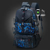A dark blue and black durable travel backpack featuring multiple pockets and an attached mobile phone charger.