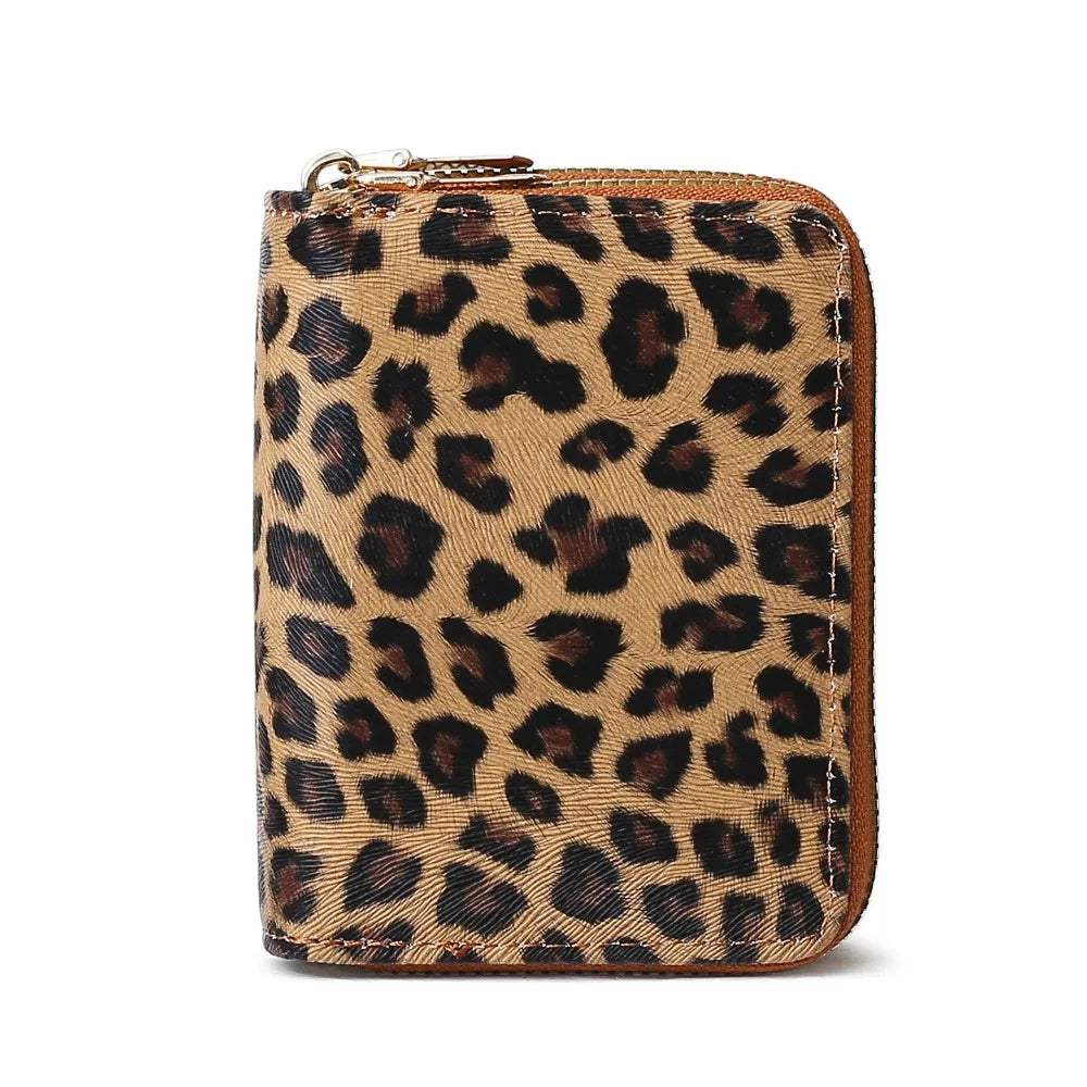 A brown leopard print double zipper wallet.