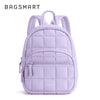 A light purple quilted laptop backpack with a flap closure and dual pockets.