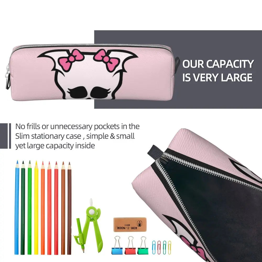 A pink elegant leather pencil case featuring a black silhouette design, shown next to colored pencils and a pair of scissors.