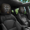 Two silicone car headrest covers with animal faces are shown inside a car cabin.