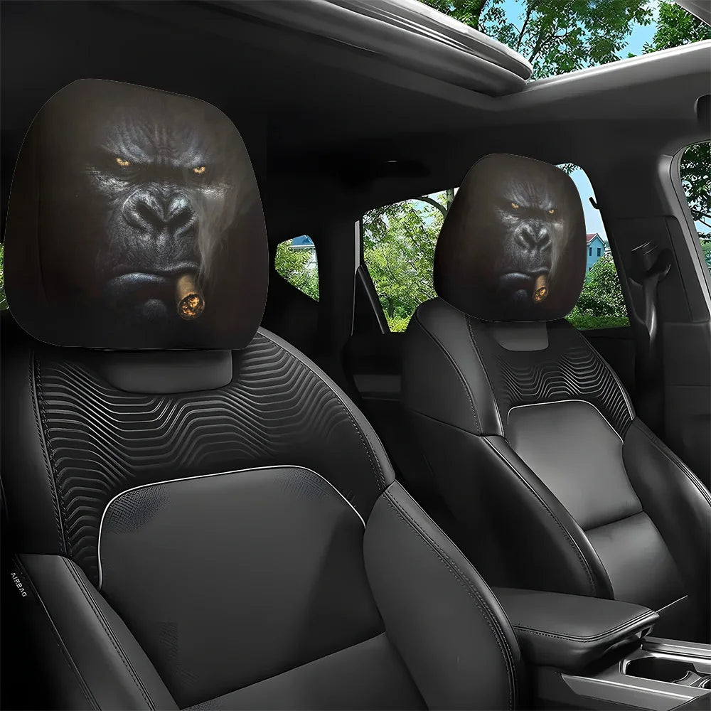Two silicone car headrest covers with animal faces are shown inside a car cabin.