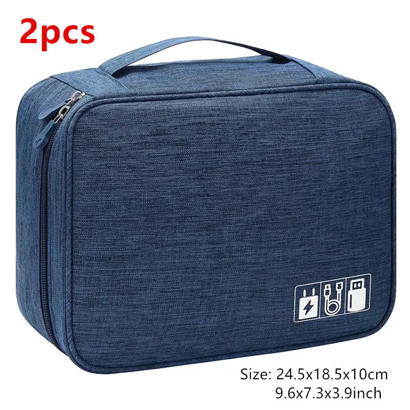 A dark blue portable digital organizer storage pouch with a zipper and power icons printed on the front.
