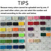 A grid of colored felt cards used as a color reference guide for selecting colors.