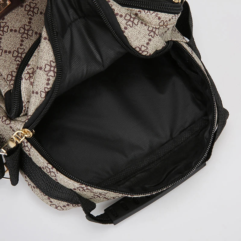 A black and beige patterned men's crossbody sling bag with a gold zipper visible.
