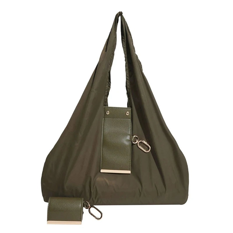 A dark olive green cloth storage pouch with a leather strap and attached keychain.