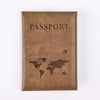 A brown leather passport holder with the word PASSPORT and a world map silhouette embossed on it.