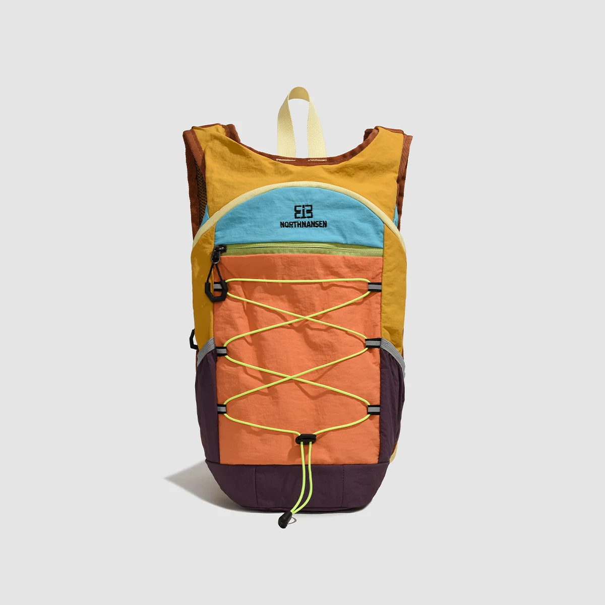 A lightweight travel hiking backpack featuring multiple colored panels including yellow, orange, and purple.
