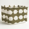 A woven storage basket made of olive green and white fabric with a textured pattern.
