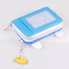 A light blue anime trifold zipper wallet with a clear ID window and a yellow charm hanging from it.