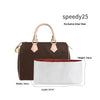 A brown leather tote bag with a beige shoulder strap and white interior lining.
