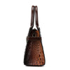 A brown crocodile embossed PU leather shoulder handbag set with leather straps.