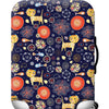 A navy blue suitcase with a colorful, repeating pattern of cats and floral designs.