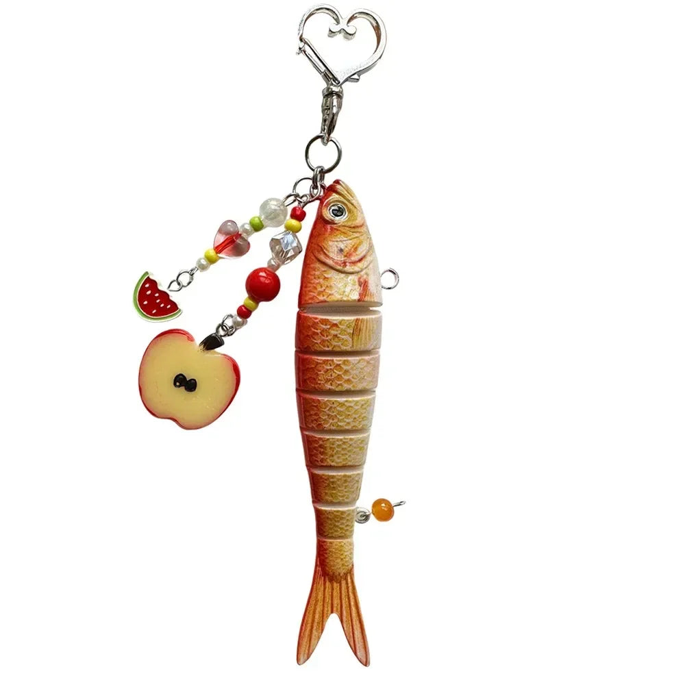 A simulation fish keychain with a hook and decorative elements.